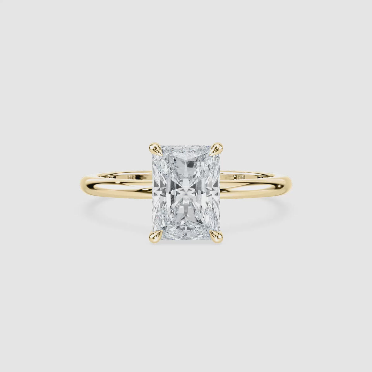 Video laden: Clara Solitaire Verlobungsring – Radiantschliff – Gelbgold – Video