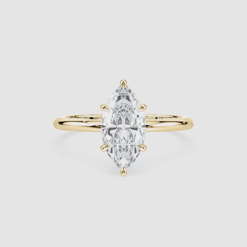 Clara Solitaire Verlobungsring – Marquiseschliff – Gelbgold – Video