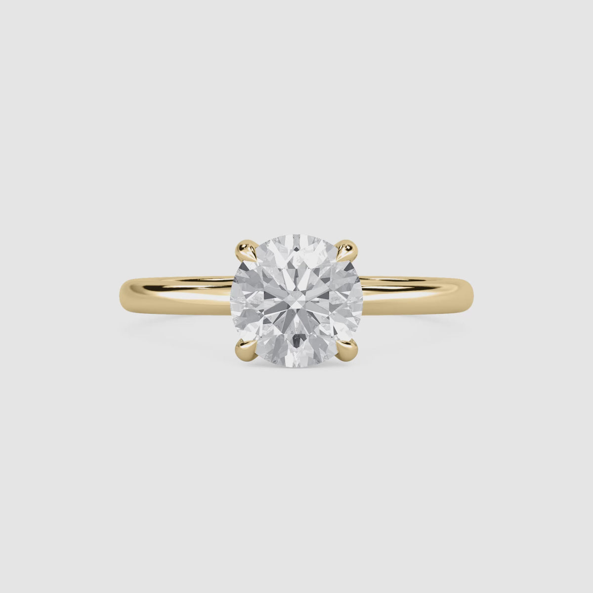 Video laden: Clara Solitaire Verlobungsring – Rundschliff – Gelbgold – Video