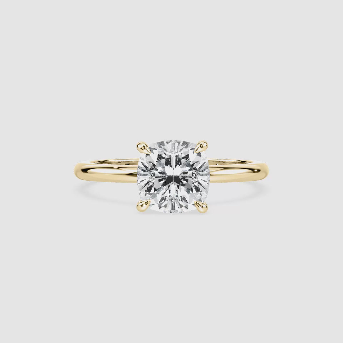 Video laden: Clara Solitaire Verlobungsring – Kissenschliff – Gelbgold – Video